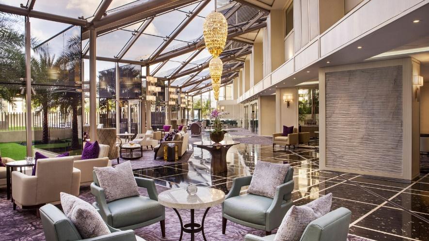 miami luxury interior design hotel lobby with chandeliers
