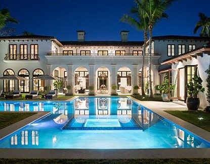 marc-michaels billionare's row luxury mansion with pool and palm trees