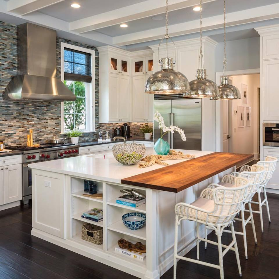 luxury kitchen with hammered metal pendant lamps with open shelves