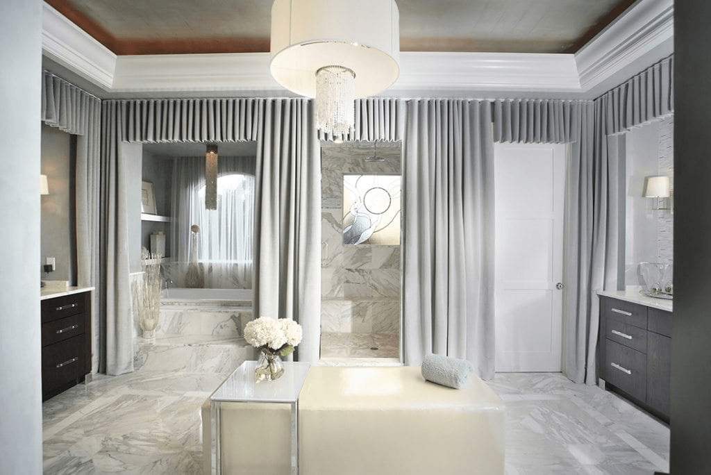 Our Organic Boca Raton project luxury bathroom, with cascading curtains, a private soaking tub, and soft lighting.